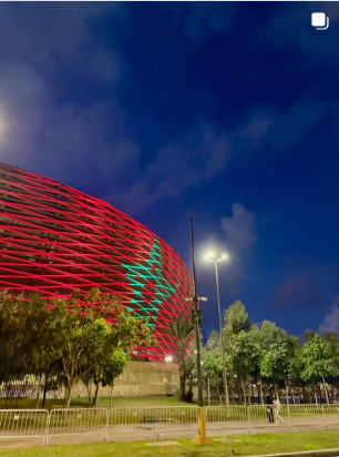Illuminated stadium at night
